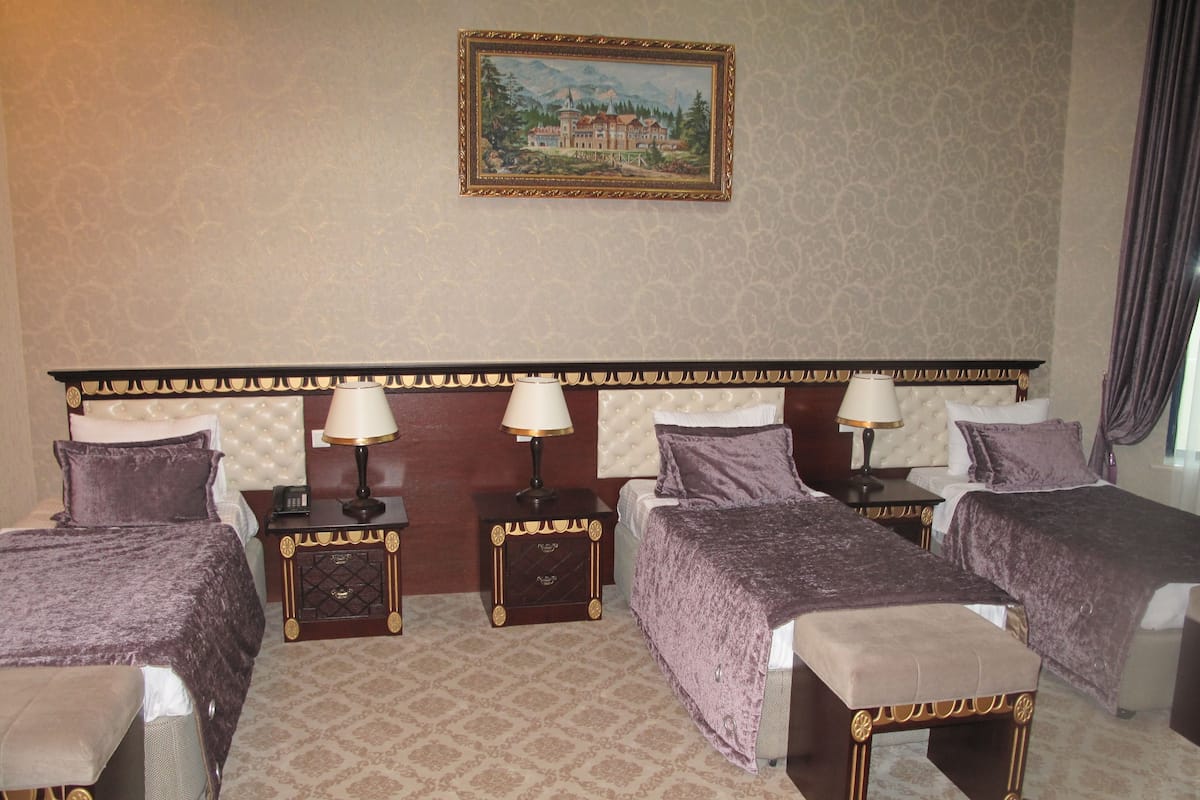 Standard Triple Room, 3 Twin Beds, Sea View | Minibar, blackout drapes, soundproofing, iron/ironing board