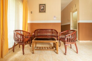 Deluxe Suite, 1 Double Bed | Living area | Flat-screen TV - OYO 644 Grand Yustik Selabintana (Sukabumi)