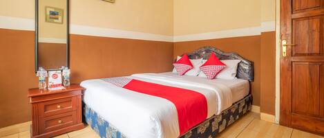 Suite Deluxe, 1 cama matrimonial | Escritorio, wifi gratis y ropa de cama