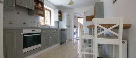 Microwave, dishwasher, cookware/dishes/utensils