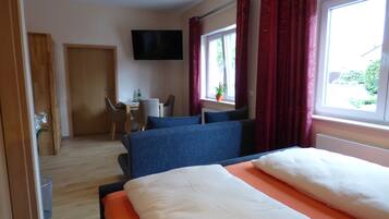 Apartment, 1 Bedroom, Accessible | Desk, laptop workspace, blackout drapes, iron/ironing board