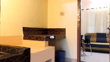 Standard Villa | Living area | 32-inch LED TV with cable channels, TV