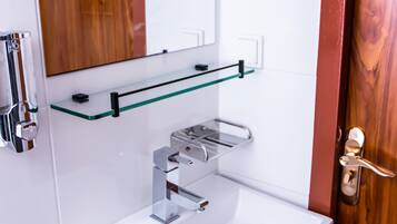 Shower, free toiletries, hair dryer, towels