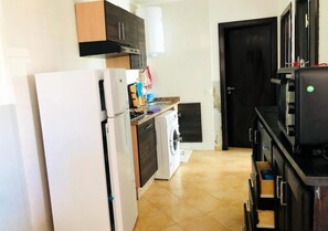 Fridge, oven, stovetop, cookware/dishes/utensils - Residence Riviera Beach 4117 (Cabo Negro)
