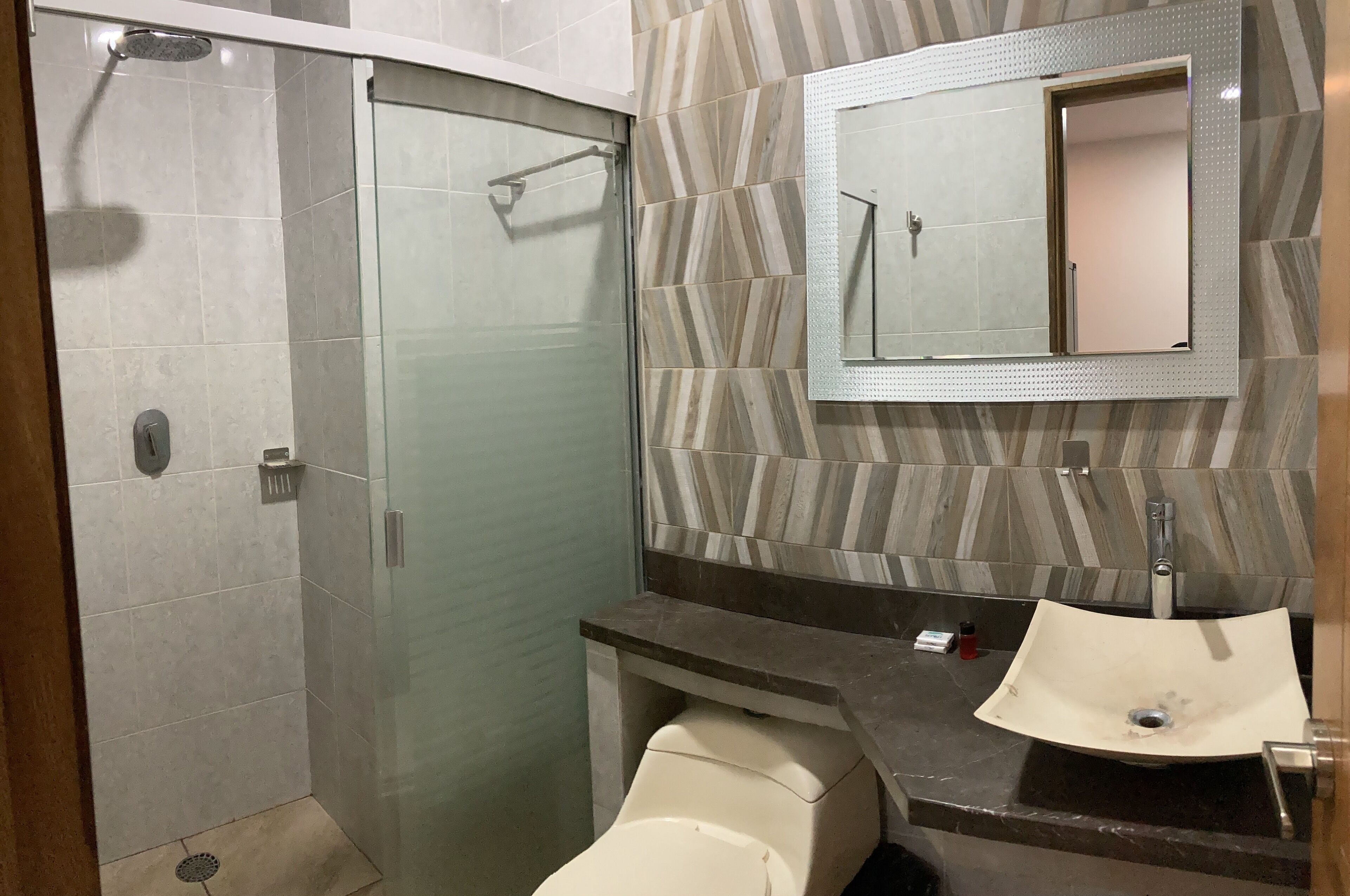 Shower, towels, soap, shampoo