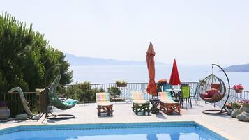 Outdoor pool, pool umbrellas, pool loungers