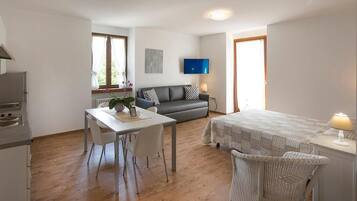 Superior Apartment, 1 Bedroom (Rocchetta) | Living area | Flat-screen TV