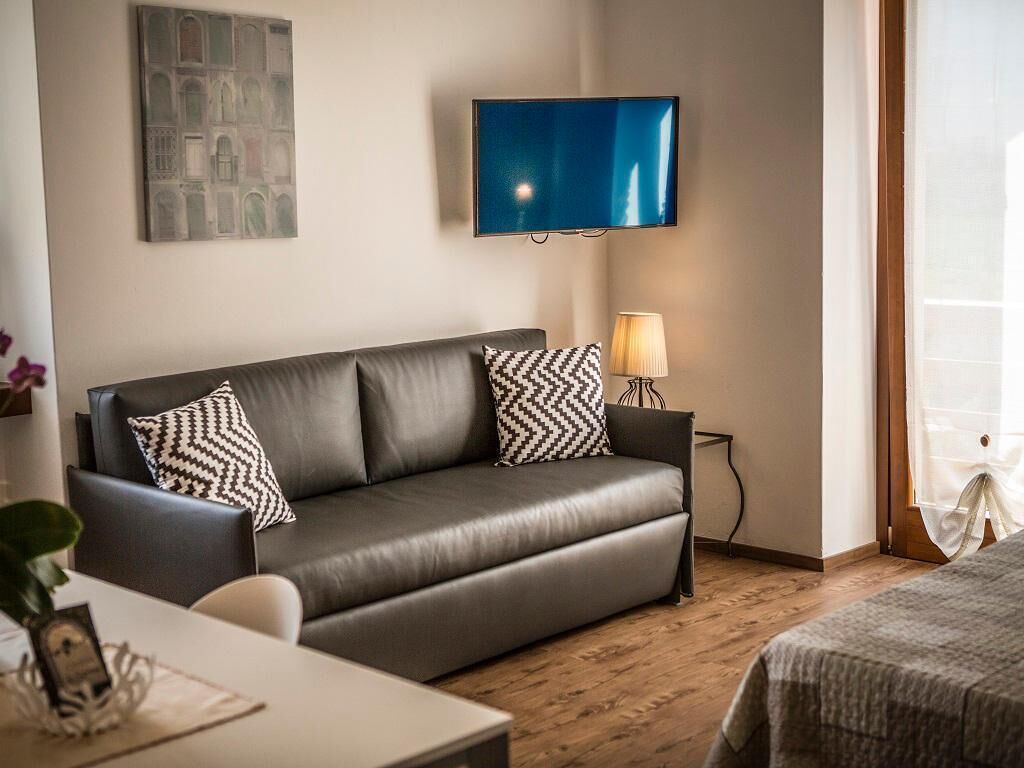 Superior Apartment, 1 Bedroom (Rocchetta) | Living area | Flat-screen TV