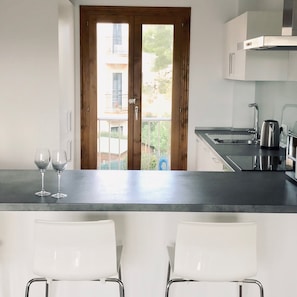 Fridge, microwave, oven, stovetop - Licensed Beautiful large 2 Bed Apartment in Puerto Pollenca. 2 pools and balcony (Puerto de Pollenca)