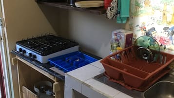 House, Multiple Beds | Private kitchen | Fridge, stovetop, coffee/tea maker, cookware/dishes/utensils
