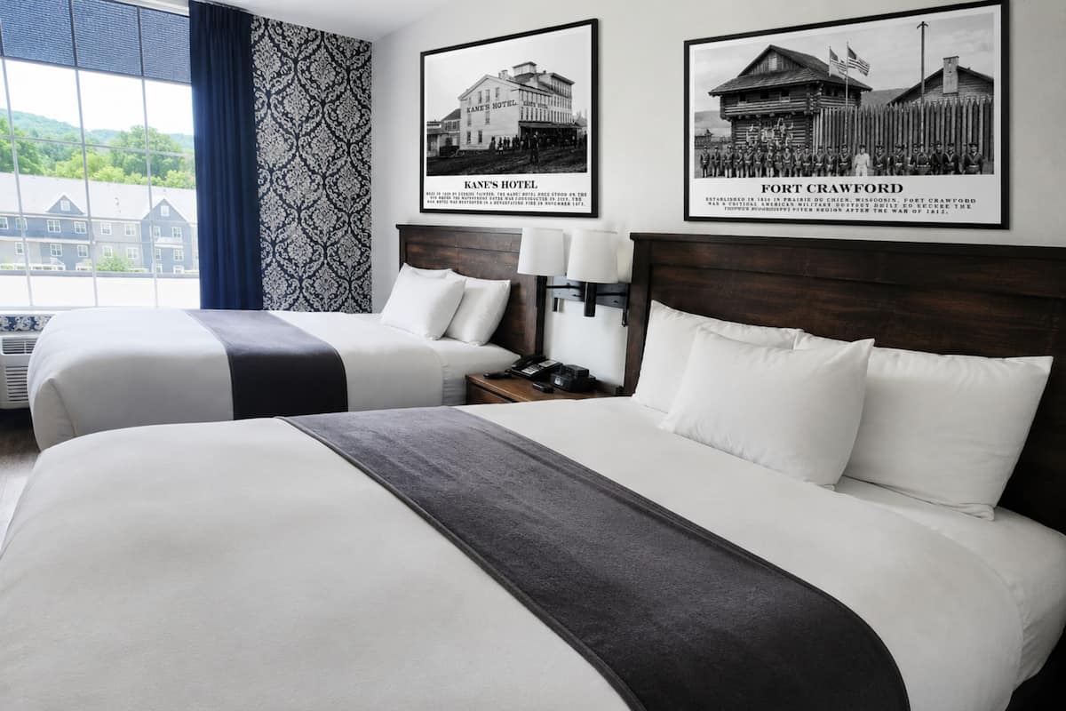 Premium bedding, down comforters, pillowtop beds, laptop workspace