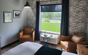Standard Room, 1 King Bed, River View | Premium bedding, down comforters, pillowtop beds, individually decorated - Waterfront Hotel (Prairie Du Chien)
