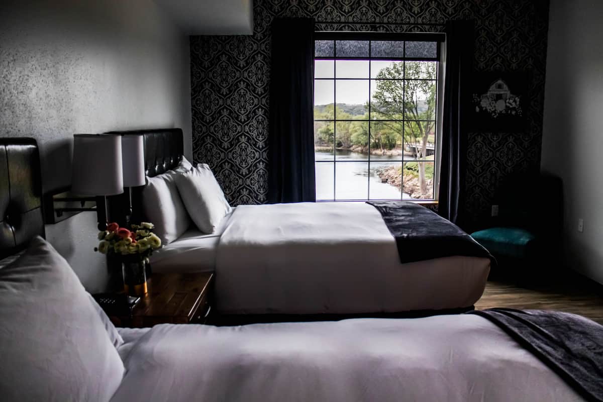 premium bedding, down duvets, pillow-top beds, individually decorated