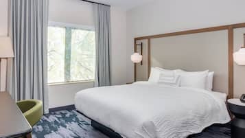 Desk, laptop workspace, blackout drapes, iron/ironing board