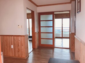 Family Condo, 2 Bedrooms, Non Smoking, Sea View (#301) | Living area | TV, heated floors
