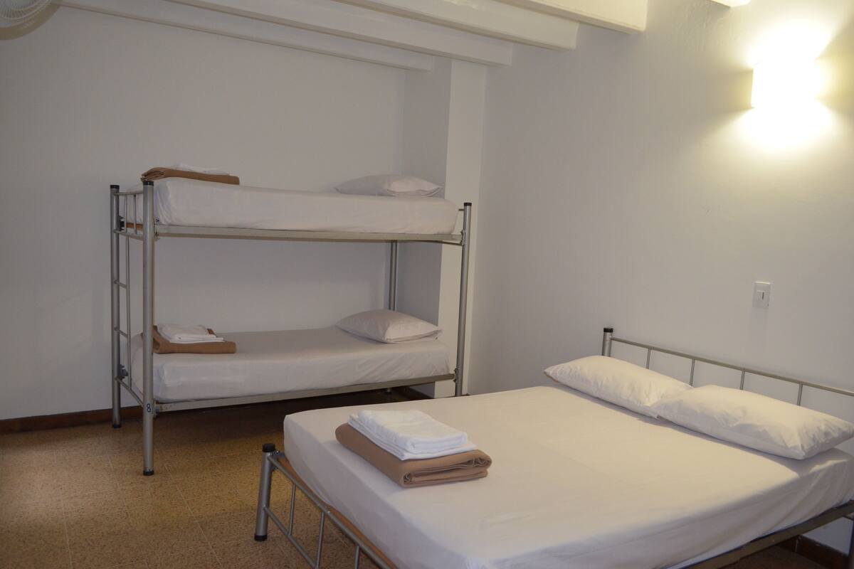Blackout curtains, iron/ironing board, free WiFi, bed sheets