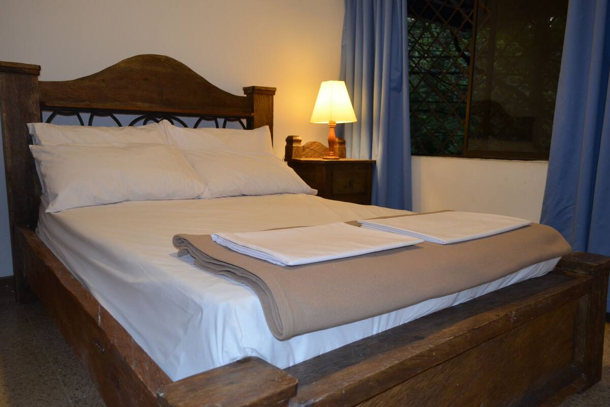 Blackout curtains, iron/ironing board, free WiFi, bed sheets