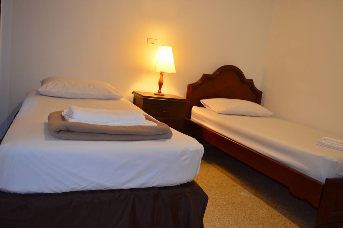 Blackout curtains, iron/ironing board, free WiFi, bed sheets