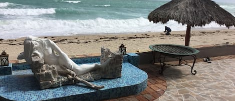 On the beach, sun-loungers, beach towels