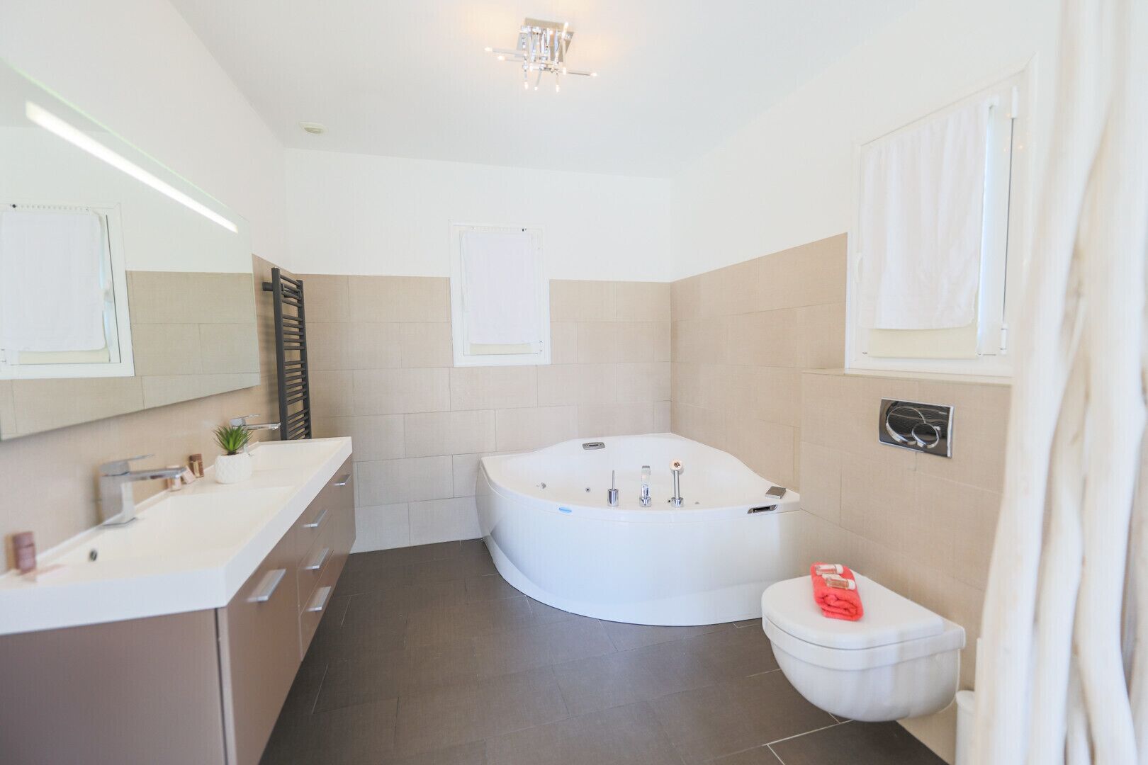 Bathtub, hair dryer, towels