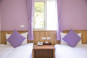 Twin Room, City View | Bathroom | Shower, hydromassage showerhead, free toiletries, hair dryer - Holiday Hotel (Nangan)