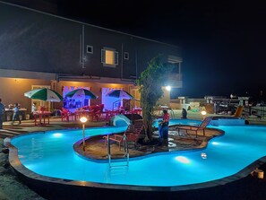 Outdoor pool, sun loungers