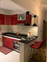 Appartamento Deluxe, 2 camere da letto | Cucina privata | Frigorifero, microonde, forno, piano cottura