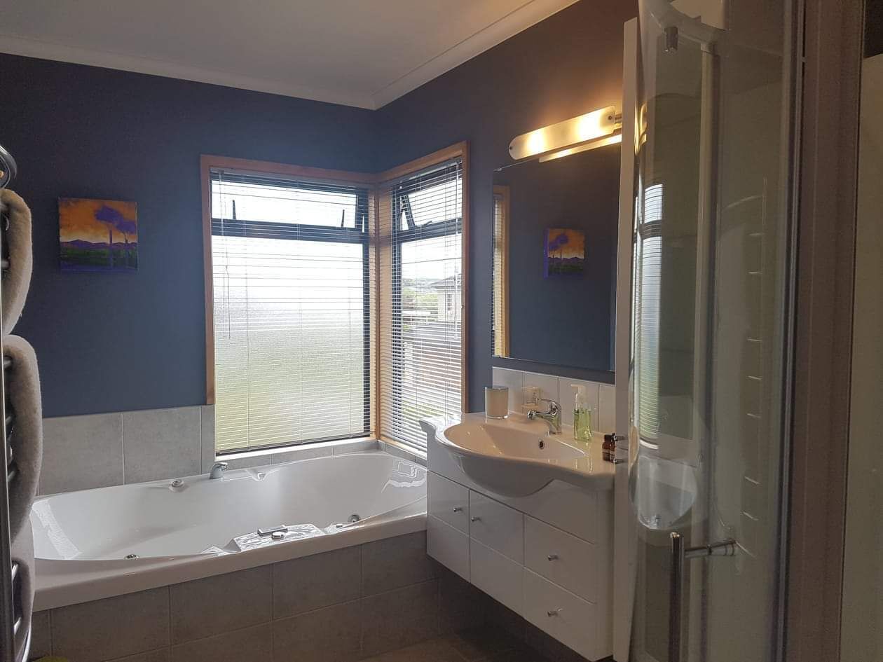 Bathtub, jetted tub, hair dryer, towels