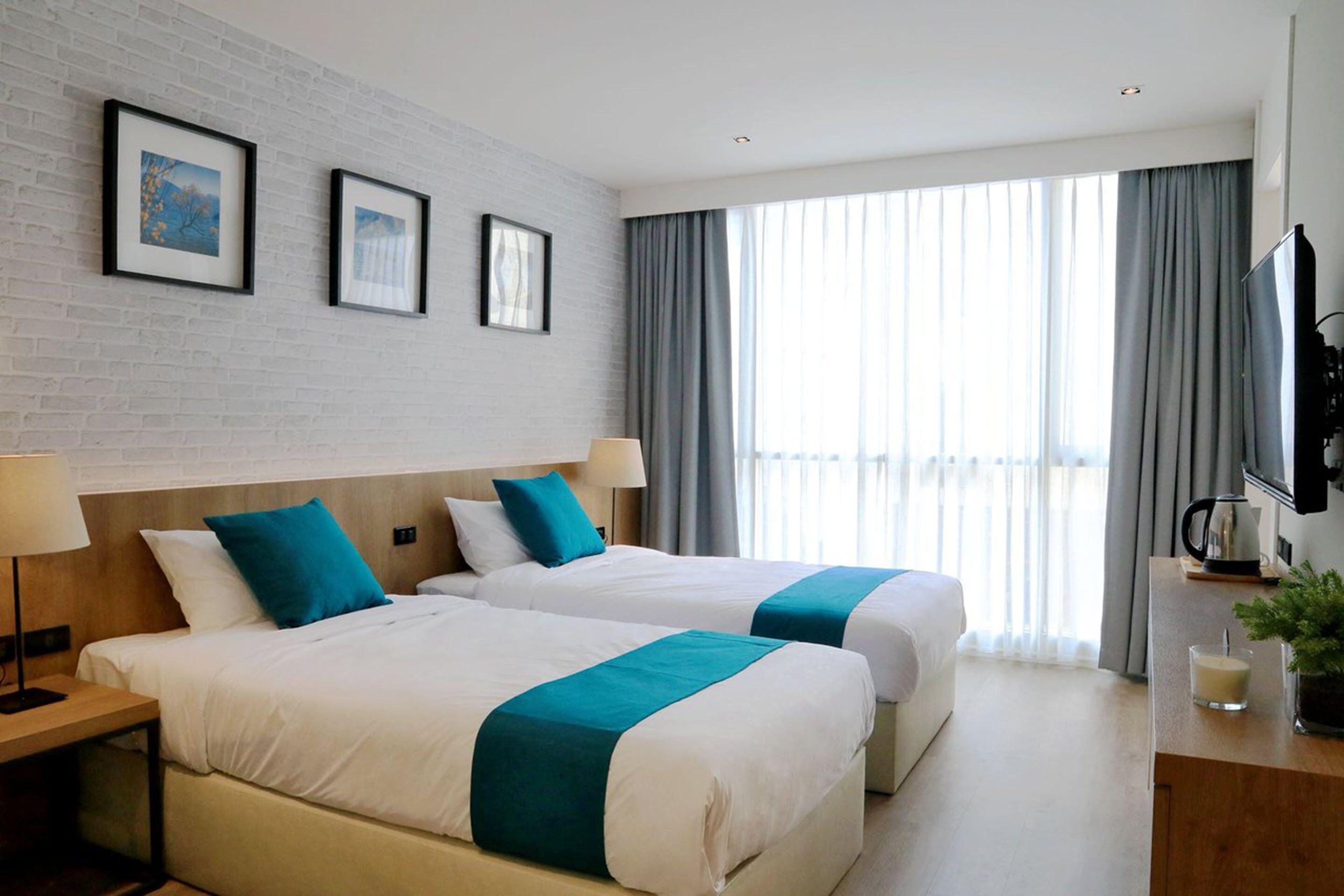 deluxe twin room | blackout curtains, free wifi, bed sheets