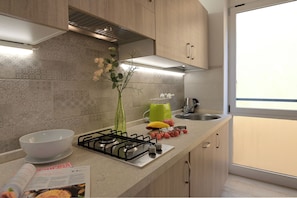 Refrigerador, microondas, placa de cocina, lavavajillas