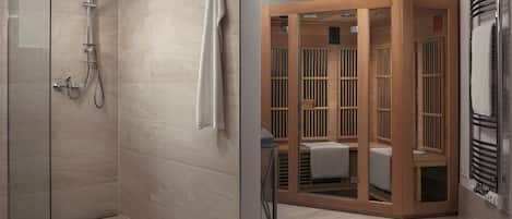 Un baño moderno con cabina de ducha de vidrio, sauna de madera y un perchero para toallas.