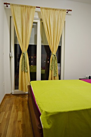 Apartment, Sea View | 2 bedrooms, soundproofing, iron/ironing board, free cots/infant beds