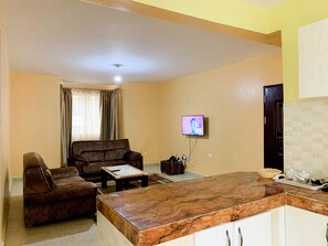 Deluxe Apartment, 3 Bedrooms, Non Smoking | Living room | TV - Easy Jkia Homestay (Syokimau)