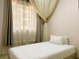 Apartamento luxo, 3 quartos, para não fumantes | 3 quartos, cortinas blackout, Wi-Fi de cortesia, roupa de cama