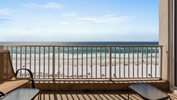 A balcony with a view of the beach and ocean. - Inn at Crystal Beach 603b * Gulf Front with Beach Chair Set. Onsite dining! (Destin)