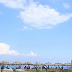 On the beach, sun-loungers, beach umbrellas, beach volleyball