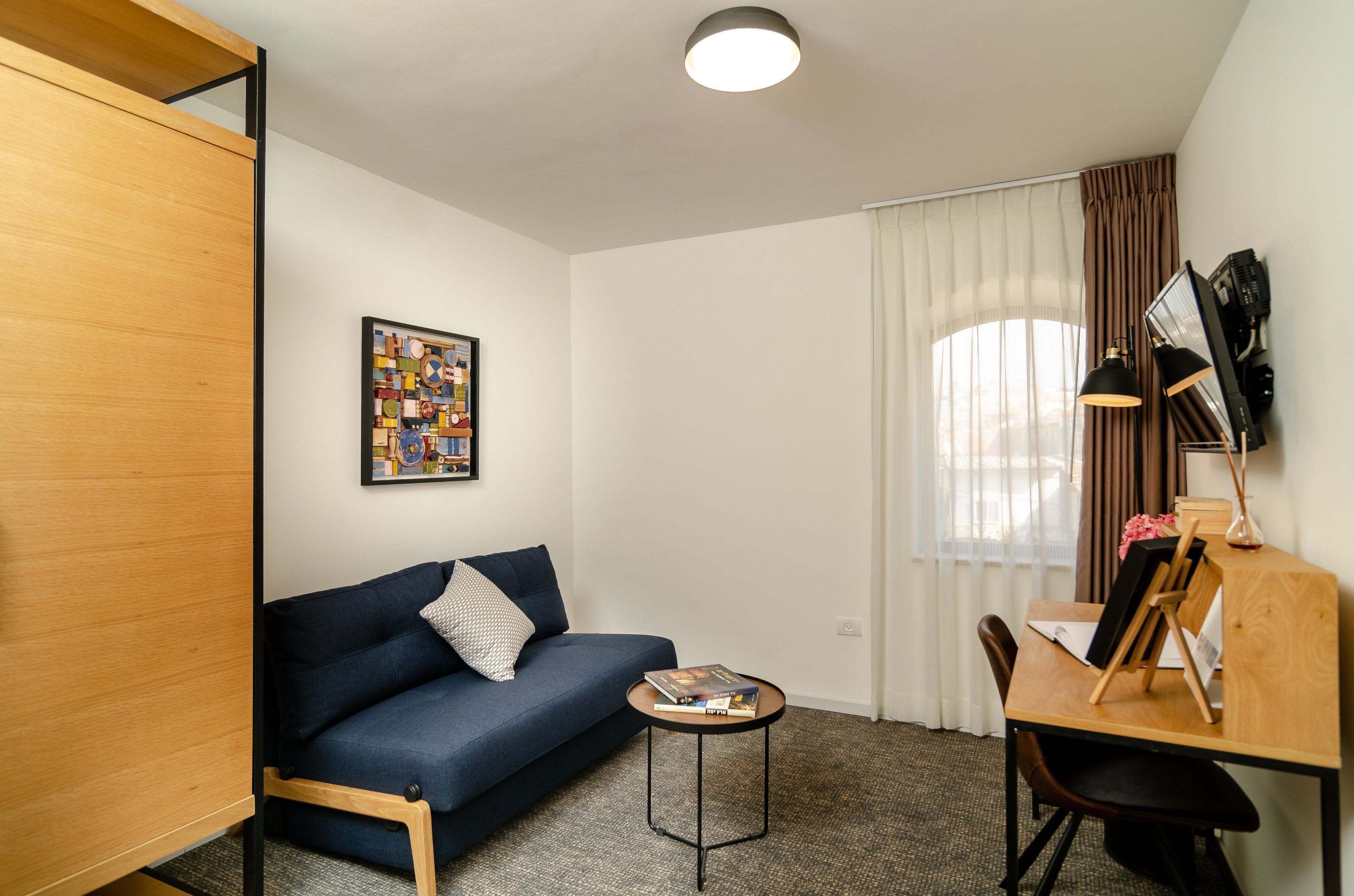 family room, city view | 2 bedrooms, premium bedding, in-room safe, individually decorated