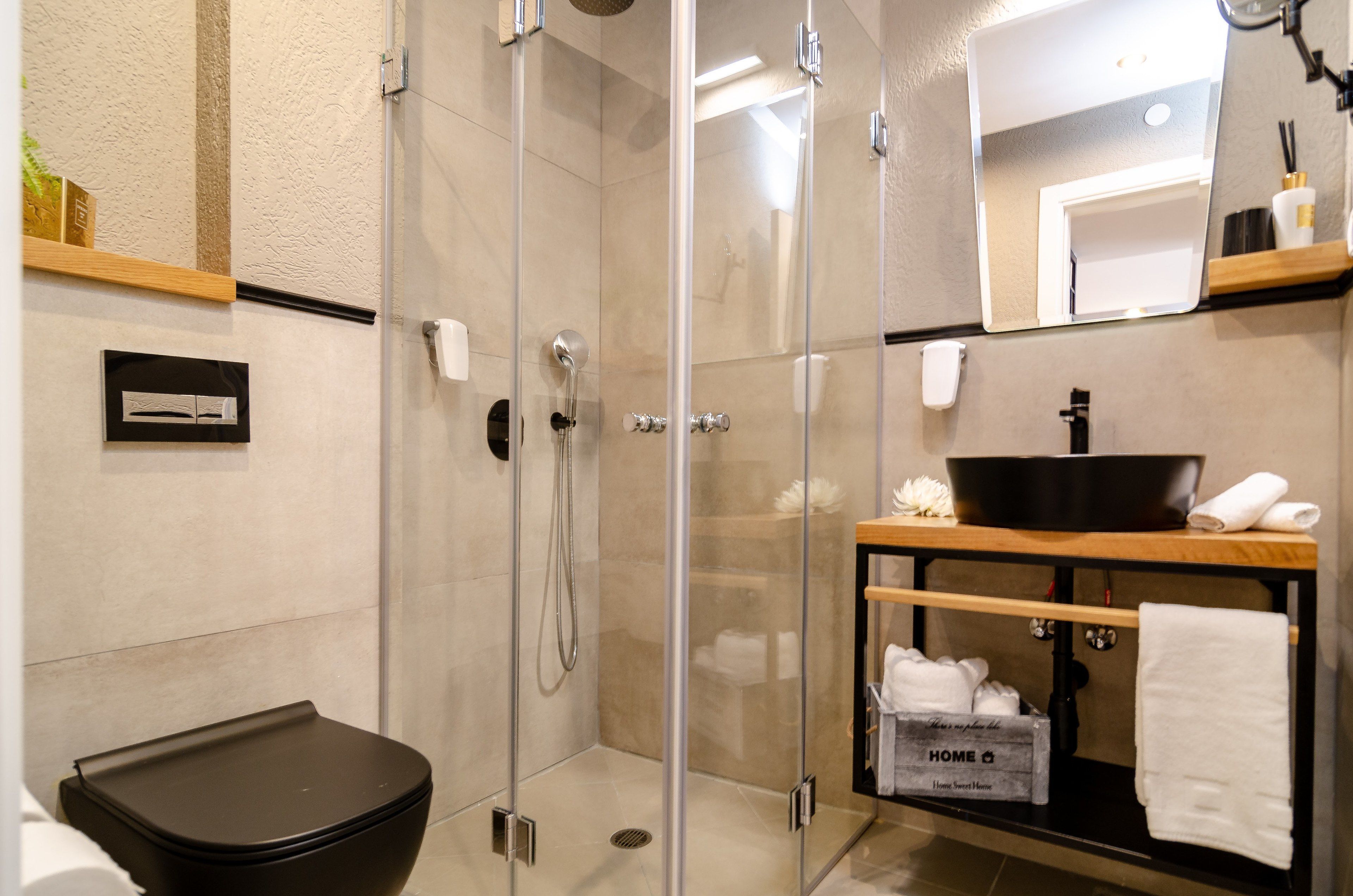 family room, city view | bathroom | shower, designer toiletries, hair dryer, towels