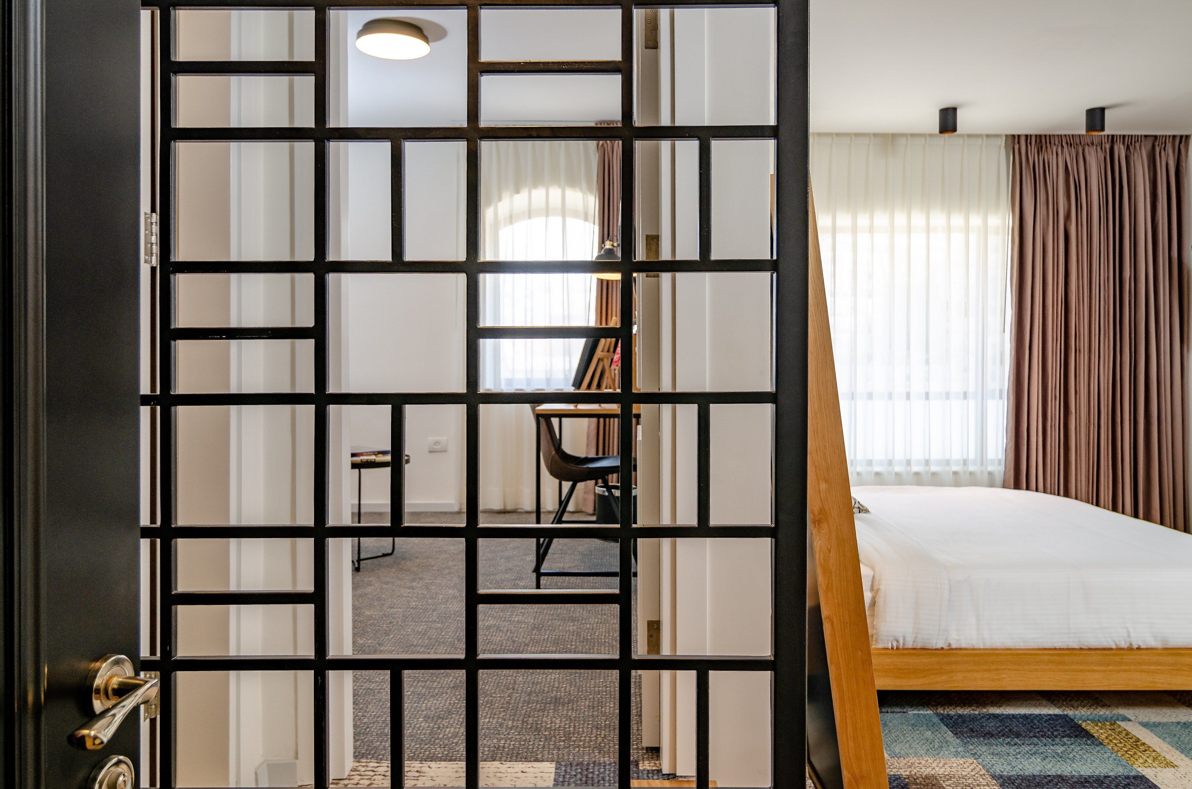 family room, city view | 2 bedrooms, premium bedding, in-room safe, individually decorated