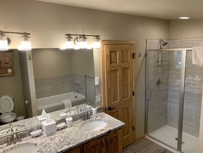 Combined shower/tub, hair dryer, towels, shampoo