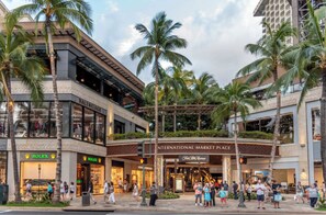 A shopping mall with multiple stores including Rolex and Saks Fifth Avenue. - Pet Friendly Guesthouse With Private Yard + Free Prkg (Honolulu)