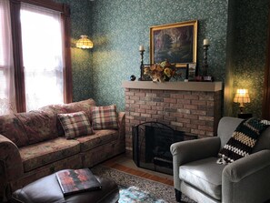 Smart TV, fireplace, books