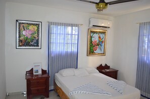 Apartamento família, 2 quartos, vista para o jardim | 2 quartos, edredons de pluma, ferros/tábuas de passar roupa