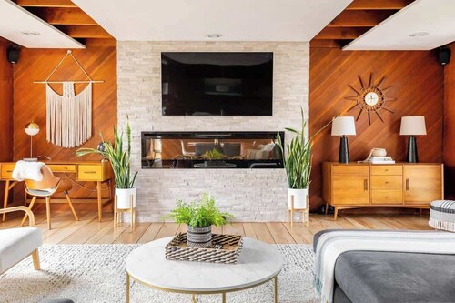 Mid Century Modern Getaway with secluded hot tub and fire pit.