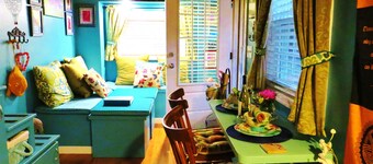 Peaceful Secret Gardens Tiny Home - loft & stairs  lead to a Queen Size Bed