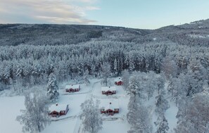 A remote cabin area surrounded by dense, snow-covered forest. - 2 bedroom awesome home in Sysslebäck (Sysslebäck)
