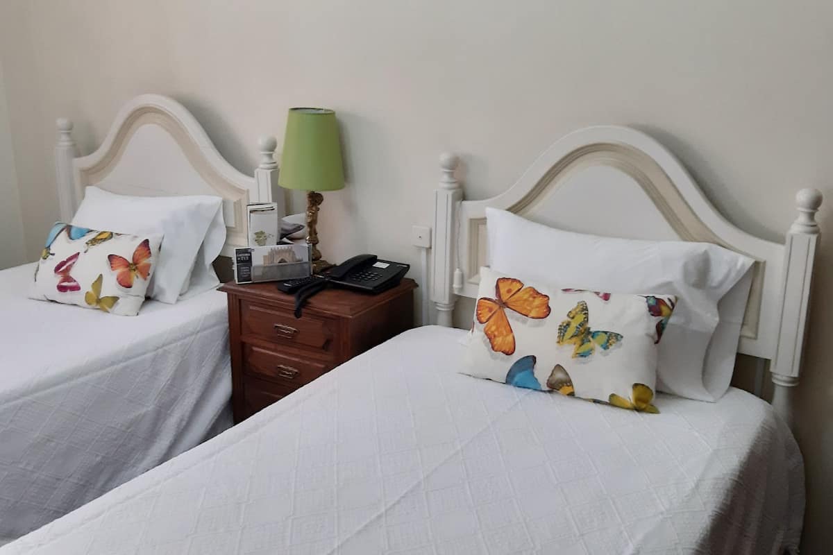 twin room, 2 single beds, city view | blackout curtains, soundproofing, free wifi