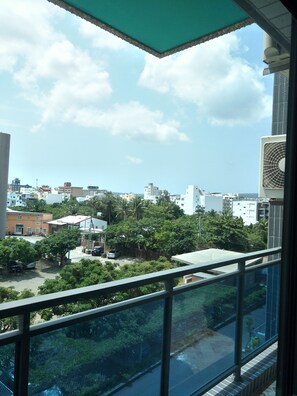 Standard Quadruple Room, 2 Queen Beds, City View | Balcony view
