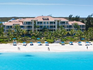On the beach, sun-loungers, beach towels