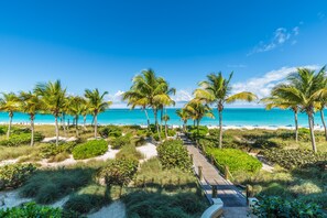 On the beach, sun-loungers, beach towels